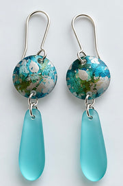 Handmade aqua sea glass and turquoise printed aluminium drop earrings by Rachel Stowe
This is probably my favourite name for the middle pair — the printed surface really does have that shoreline/drifting-water quality.