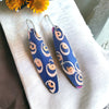 Blue and gold swirl
Aluminium feather style
Earrings glossy finish Rache-stowe