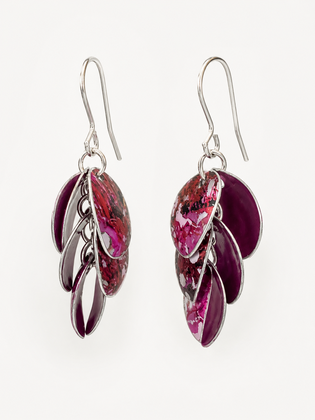Handmade Cascade drop earrings in berry pink, plum and red printed anodised aluminium with sterling silver ear wires.