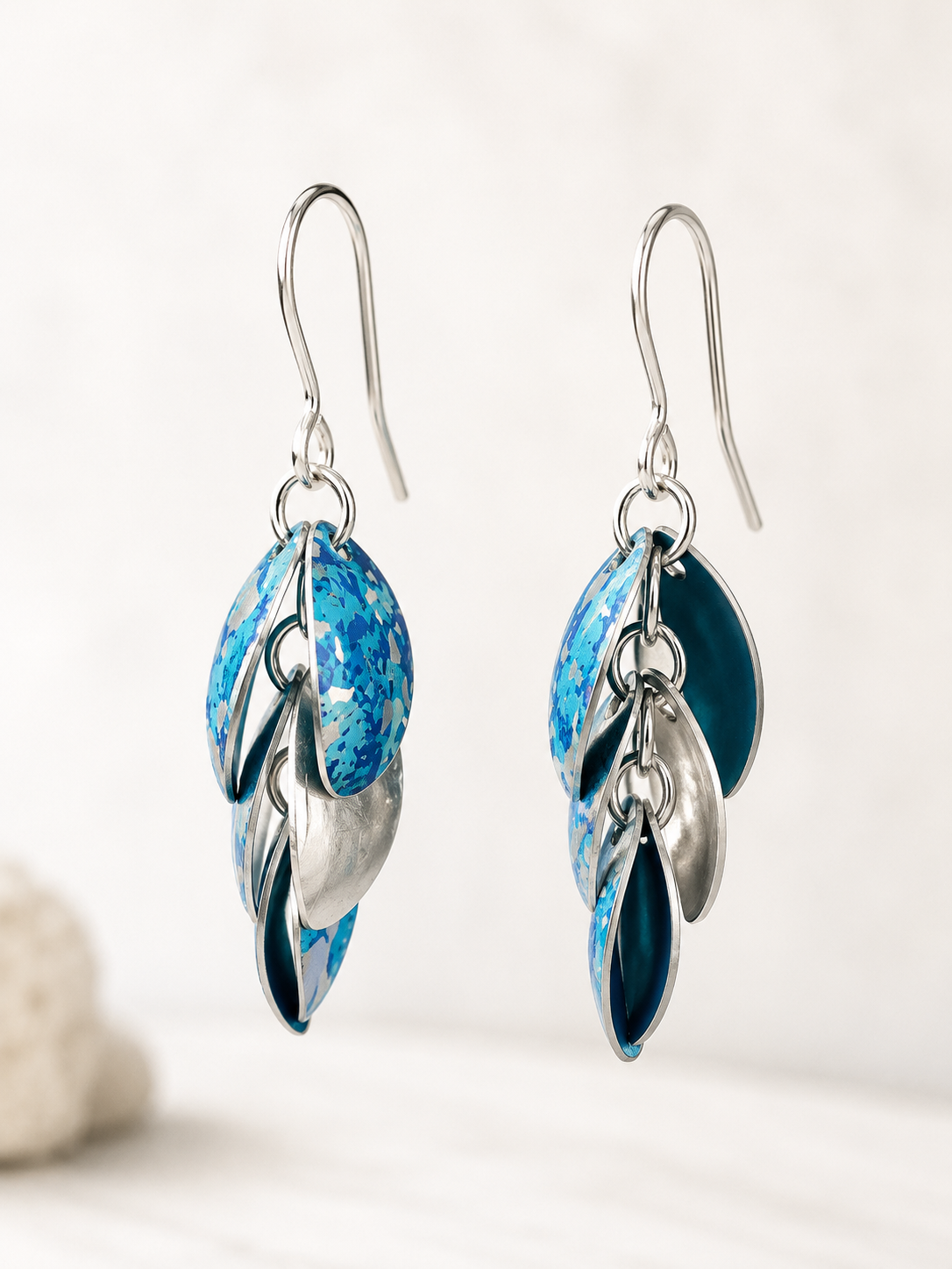 Handmade Ocean Blue Cascade drop earrings in turquoise printed anodised aluminium with sterling silver elements and ear wires.