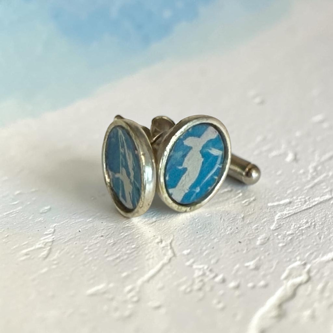Sterling Silver and aluminium inlay turquoise.