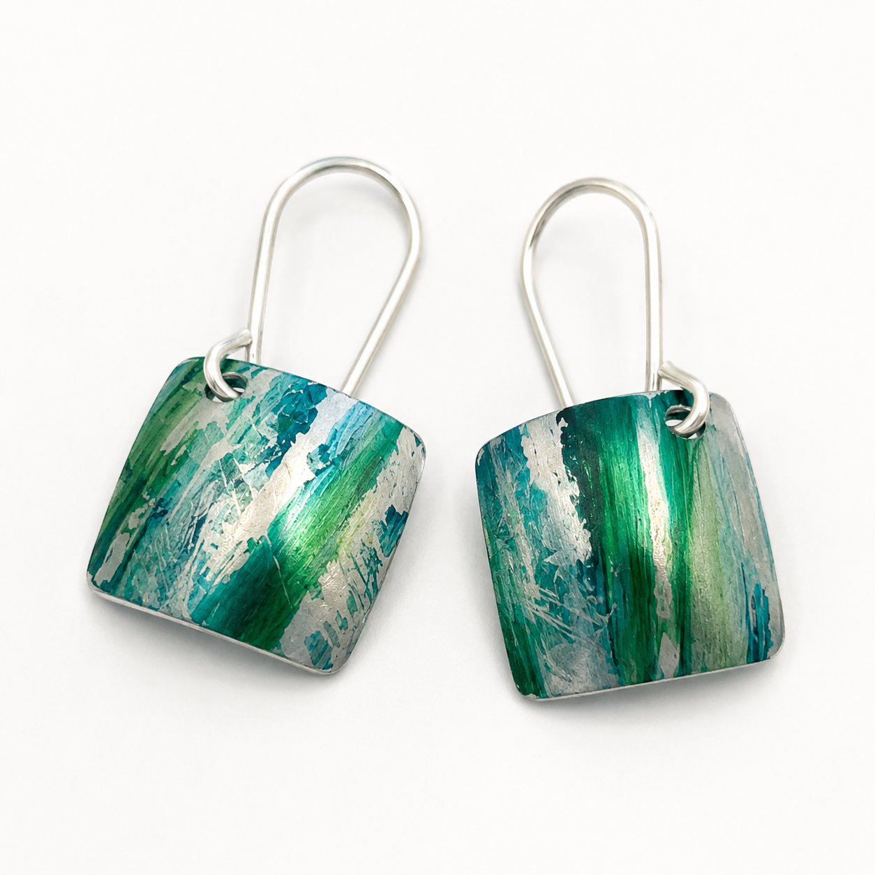 Tidal Green handmade square anodised aluminium drop earrings in turquoise and sea green with sterling silver ear wires.