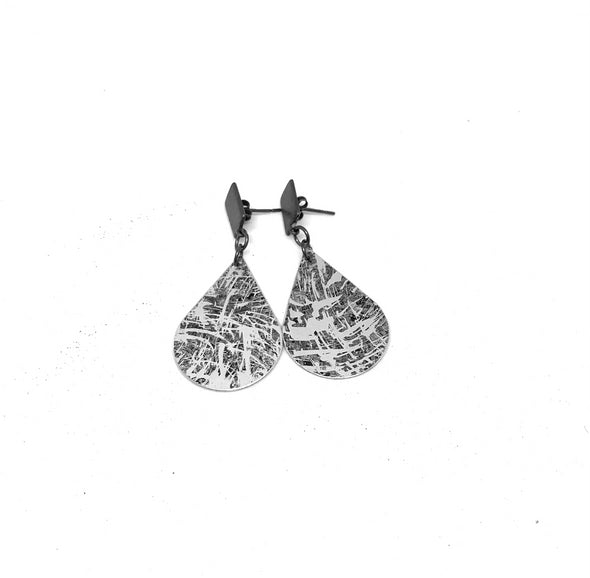 Metallic Rock and oxidised teardrop earrings