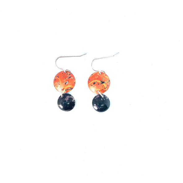 Orange and glossy black in colour hand-printed and hand-dyed anodised aluminium earrings by rachel-stowe