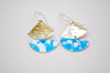 Sterling silver hammered and dyed blue aluminium boat style earrings by rachel-stowe
