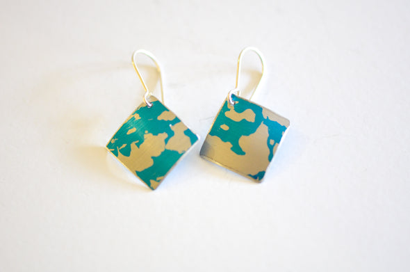 Turquoise / aluminium hand printed earrings part of the seaweed collection earrings by rachel-stowe